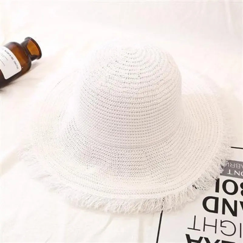 Cappello a secchiello con frange