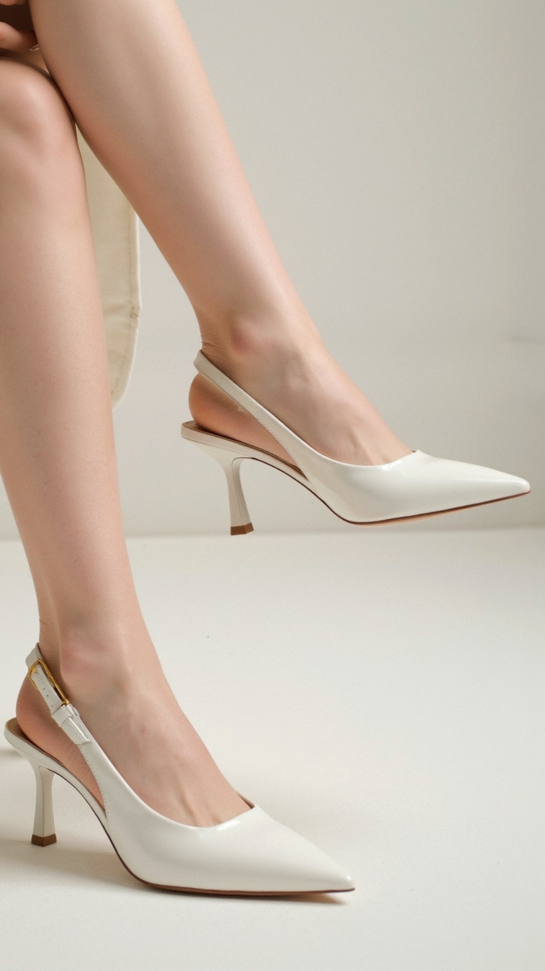 Elizabeth Pumps con slingback basso